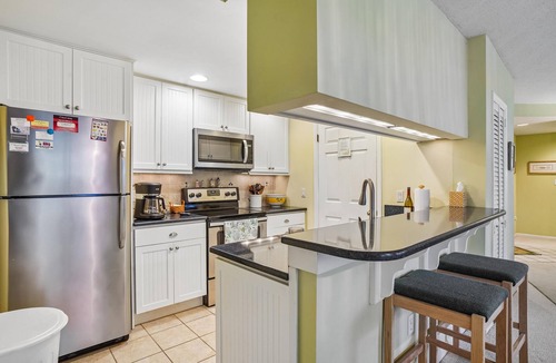 Bethany Beach Condo | Free Golf at Bear Trap Dunes and MORE! 2 Bedroom 2 bath. first floor Sea Colony West unit with a beautiful view of the lake.