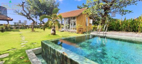 Kalisada House | Rumah Putih Beachfront Bungalow