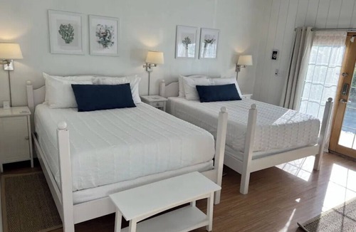 Rehoboth Beach Hotel | Sandpiper Room — Spacious Coastal Luxury with a Private Garden Patio