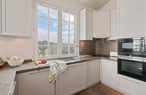 L'Europe Apartment | Stunning panoramic views perched in the heights among Paris' rooftops